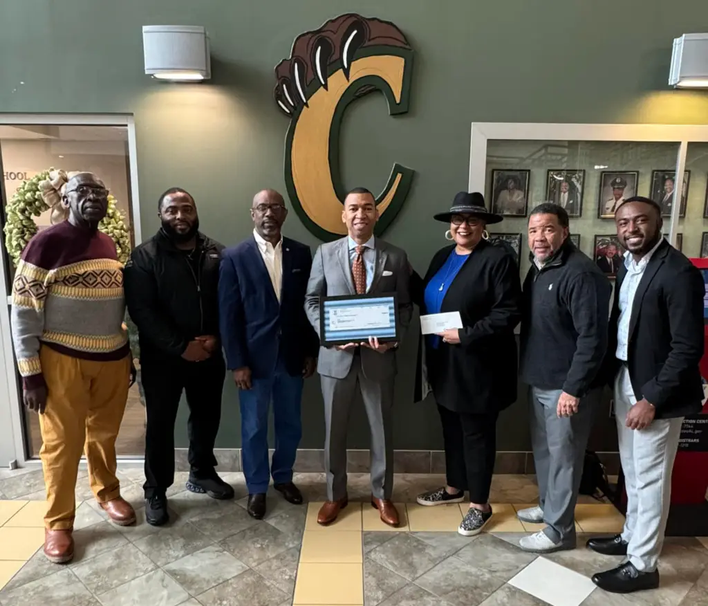 Sen. Kirk Hatcher, Rep. Kenyatté Hassell, County Commission Vice Chair Carmen Moore Zeigler, Mayor Steven Reed, Gary Hall, and Carver High School staff